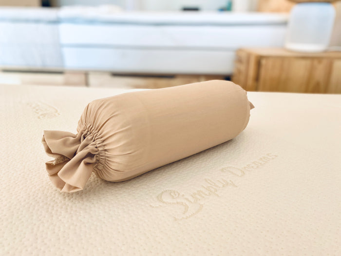 organic bamboo lyocell baby bolster case in beige color with ruffled ends