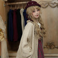 Frilled Cardigan with Bird Buttons