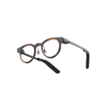 MemoMind One Custom Edition smart glasses with Amber accented frames.