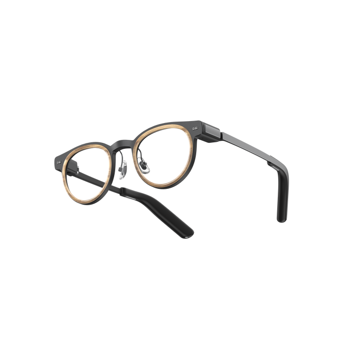 MemoMind One Custom Edition smart glasses with black and gold frames.