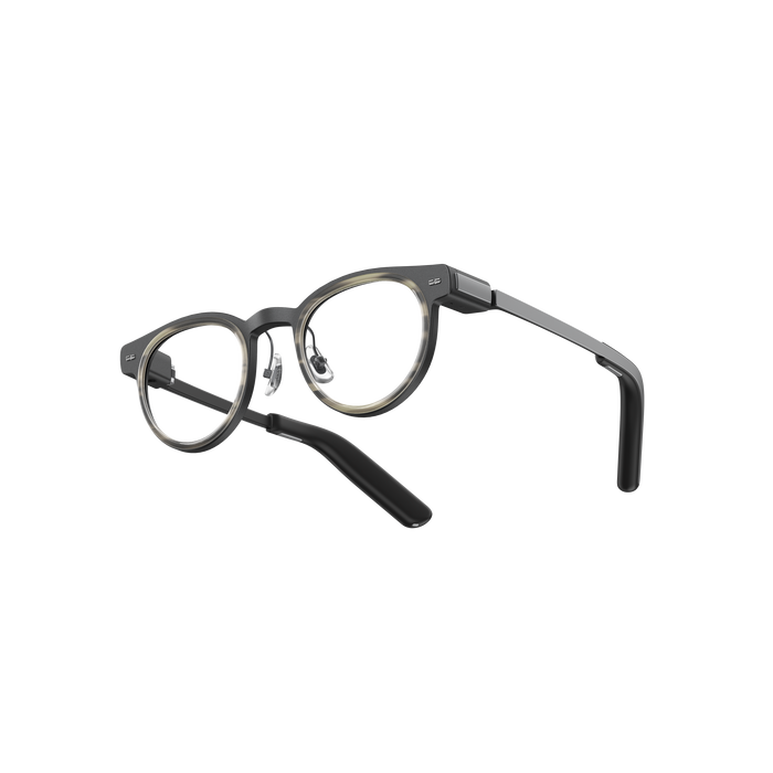 MemoMind One Custom Edition smart glasses with crystal white frames.
