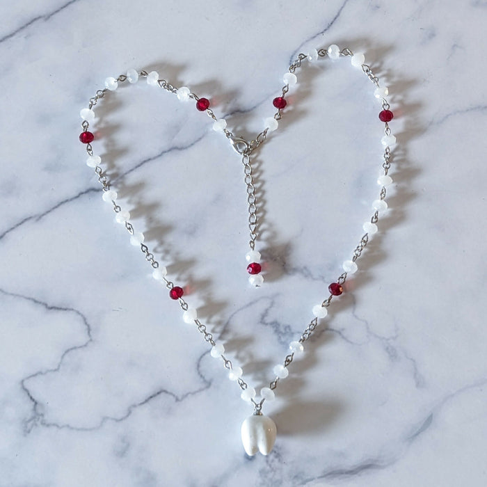 Toothache Necklace